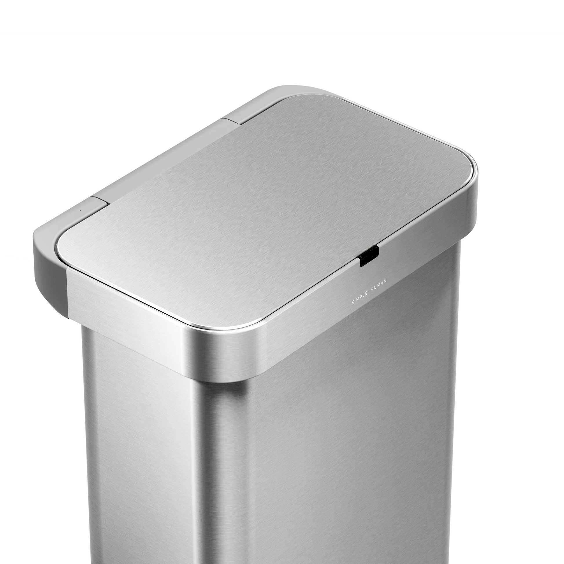 Detail view of Simplehuman 58L Rectangular Sensor Can in Brushed Stainless Steel showing touch-free sensor lid.