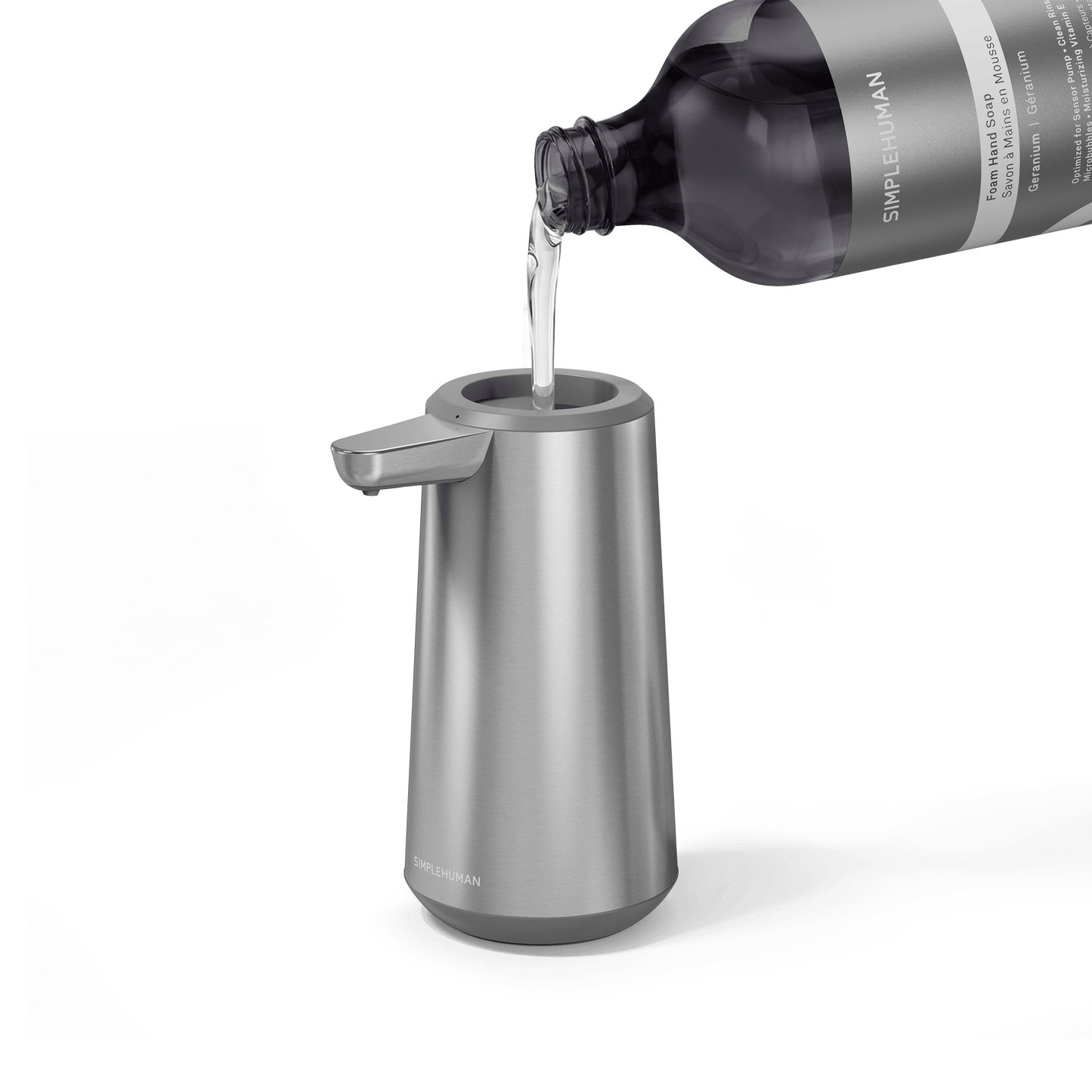 Simplehuman's Refill Bottle filling a Simplehuman Sensor Pump Foam.